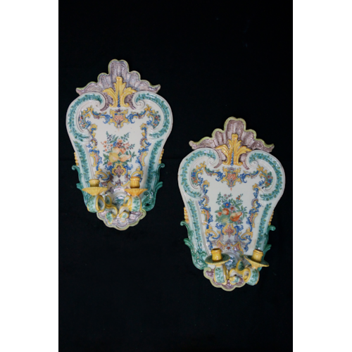 A very important and unique pair of late-Baroque Italian polychrome majolica two- light wall-sconces